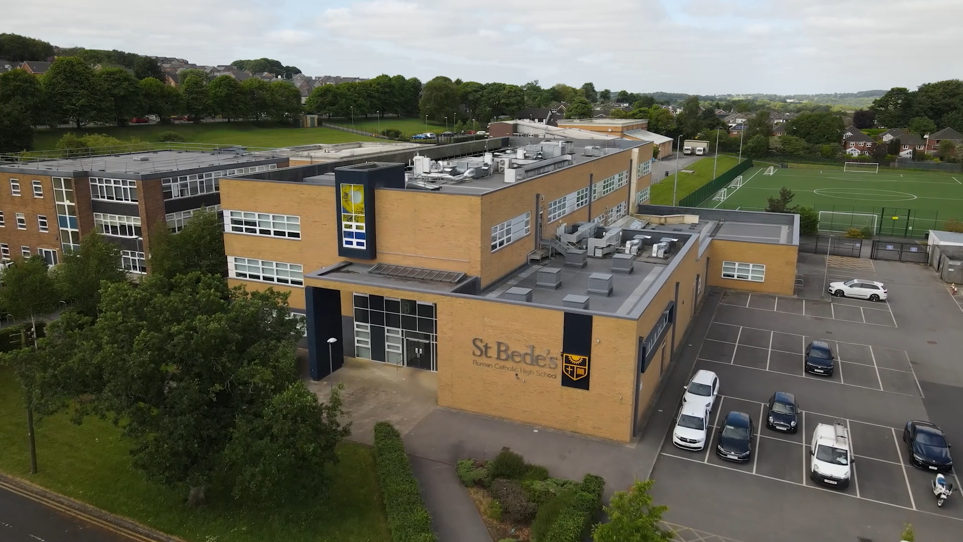 Aerial view of St Bedes Catholic School in Blackburn, showcasing its sprawling campus and modern facilities.