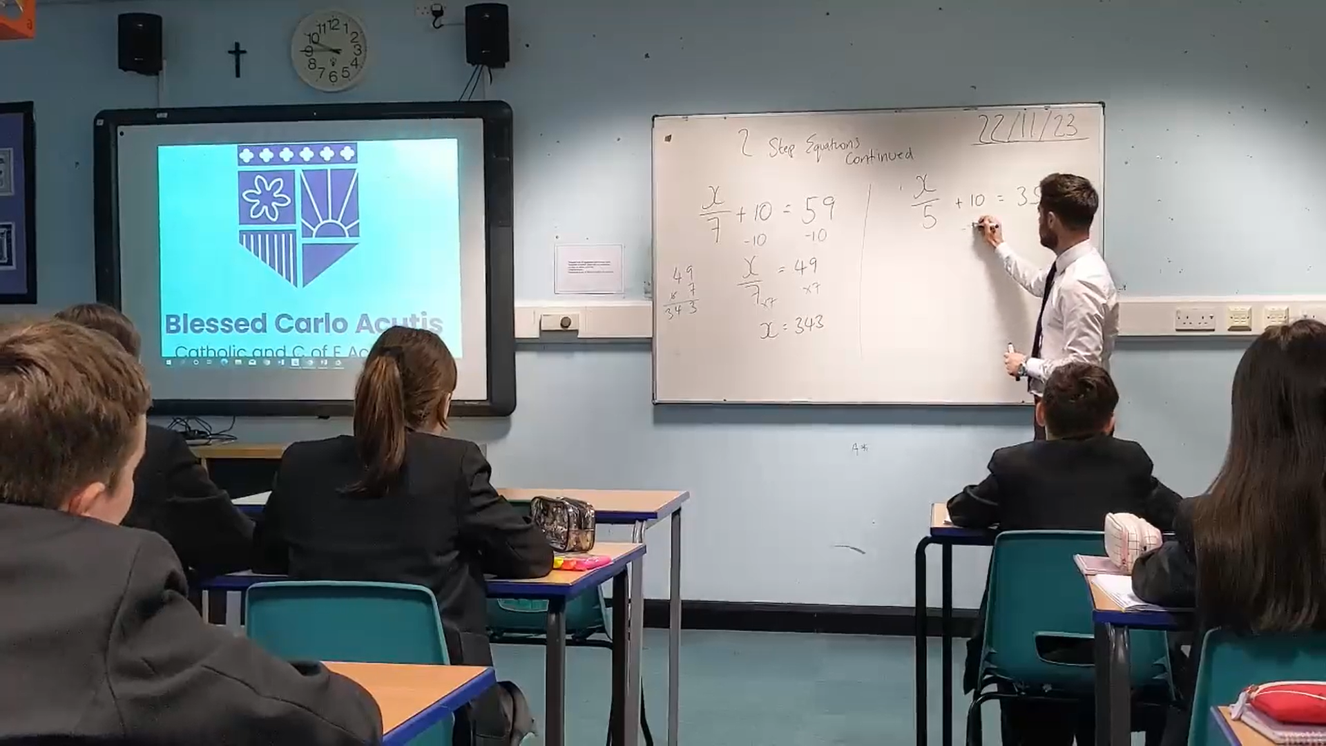 A teacher instructing a Year 7 class at Blessed Carlo Acutis School.